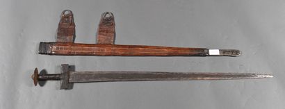 null Tuareg sword with its decorated leather scabbard, with its 2 leather lines with...