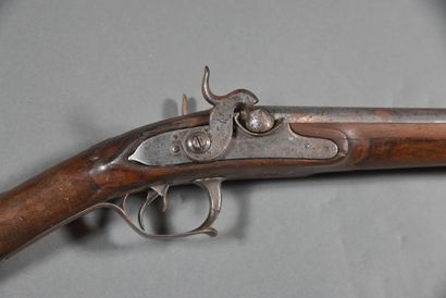 null 2-shot shotgun, with modified flintlock percussion caps, stock carved with a...