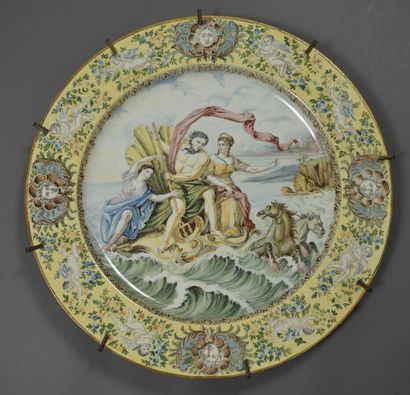 null In the taste of CASTELLI.
Large, round, plain-edged earthenware dish with polychrome...
