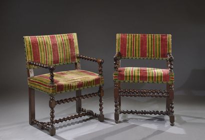Two walnut arm chairs with screw-turned legs...