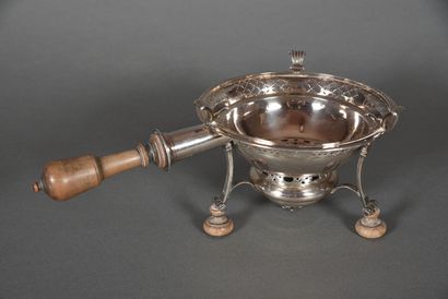 null Openwork silver table stove, turned wooden handle and legs. 
Marked cock, goldsmith...