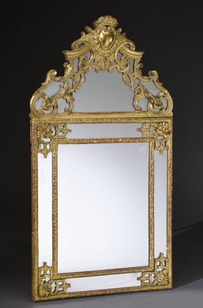 Carved and gilded wood mirror with inverted...