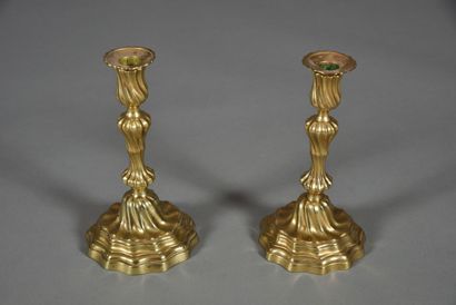 Pair of brass torches with twisted ribs,...