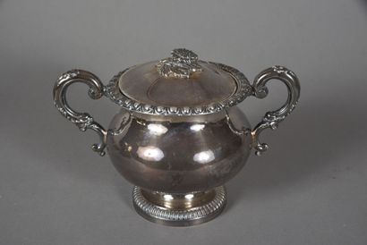 null * Silver sugar bowl decorated with gadroons, foliage and flowers. 
Minerve hallmark....