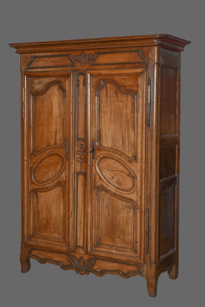 Oak and cherry armoire, opening to two large...