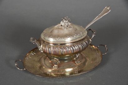 null Sauce boat on tray in the Louis XV style, ovoid shape with gadrooned ribs, flowered...