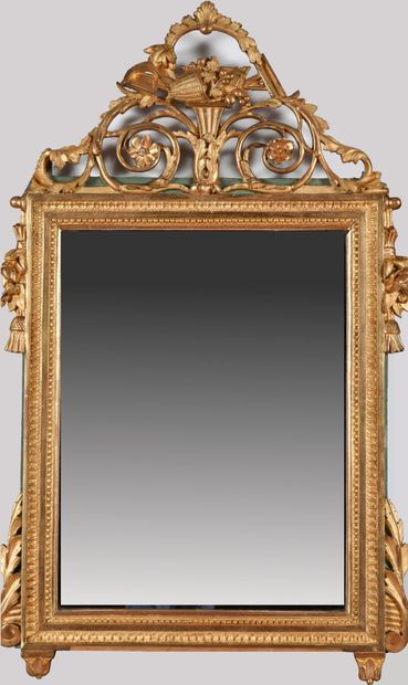 Carved wood mirror, gilded, frame decorated...