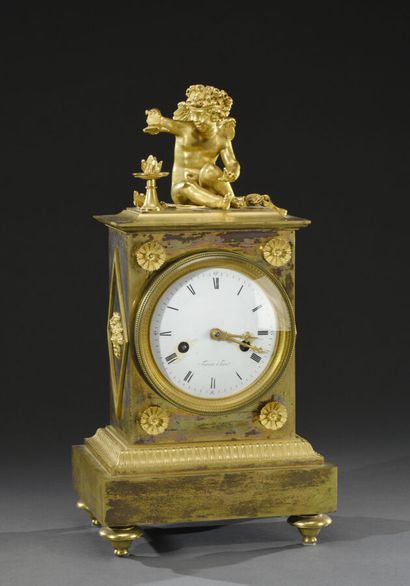 Gilt bronze terminal clock, surmounted by...