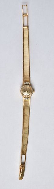 null OMEGA: Ladies' watch in 18K (750/oo) yellow gold, the bezel adorned with 6 brilliant-cut...