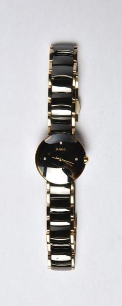 RADO: Black ceramic and gilded metal watch,...