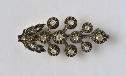 null Lightly vermeiled silver (800/oo) foliate brooch with round motifs set with...