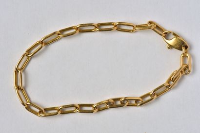 null CARTIER : Bracelet en or jaune 18K (750/oo), collection "Santos" à maillons...