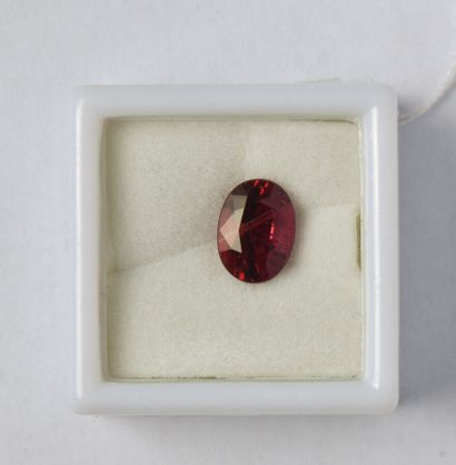 A red Spinelle, unmounted, oval stone weighing...