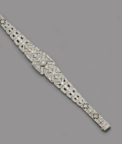 null Bracelet en or gris 18K (750/oo), de style Art Déco, à maillons ajourés articulés,...