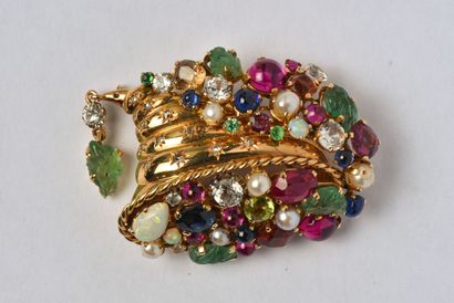18K (750/oo) yellow gold brooch featuring...