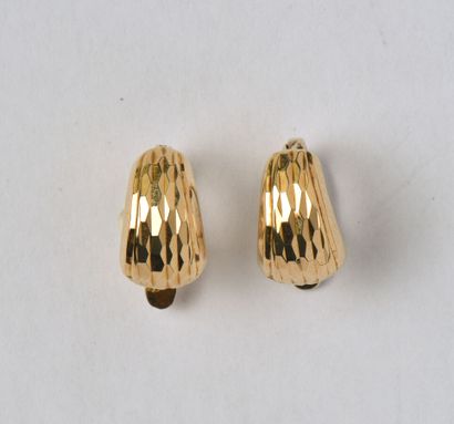 Pair of faceted earrings in 18K (750/oo)...