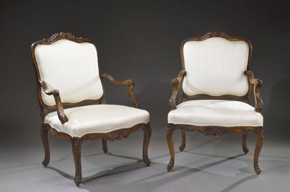 Two Queen's armchairs in patinated walnut...