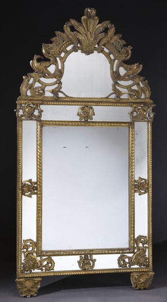 Regency-style gilded and carved wood mirror,...