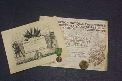 null Lot comprenant : 

- Une médaille de la Marne et son diplôme attribué au soldat...