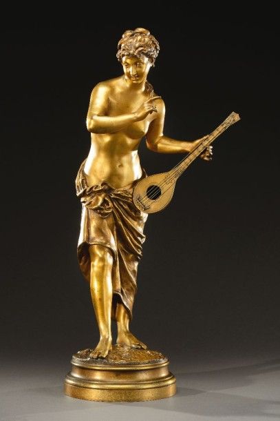 E. ROUSSEAU E. Rousseau

« Joueuse de mandoline »

Bronze, patine dorée.

Signé.

Hauteur...