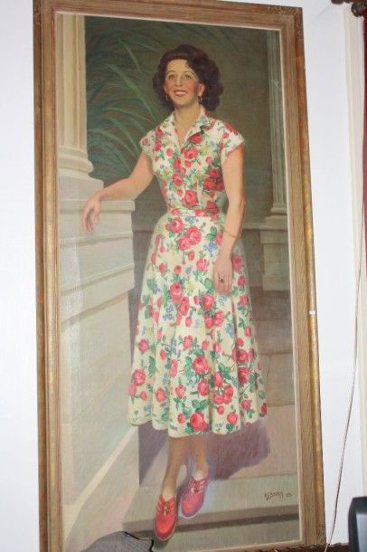null A.J. Boura, Femme à la robe à fleurs, huile sur toile signée en bas à droite...