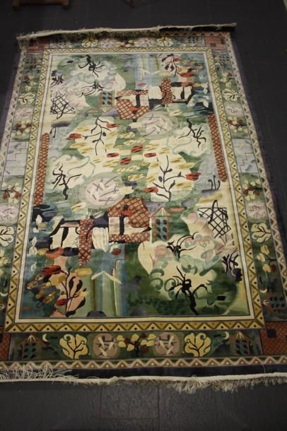 null Chine, grand tapis en soie à décor de paysage.

300 x 202 cm.