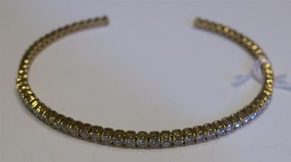Bracelet jonc ouvert en or jaune 18K (750/oo)...