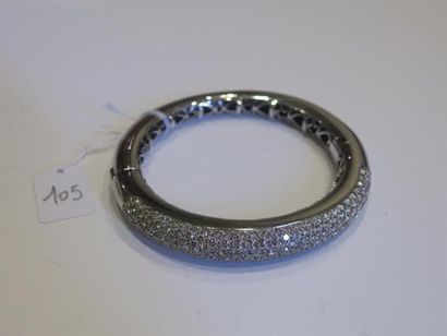 Bracelet jonc ouvrant en or gris 18K (750/oo)...