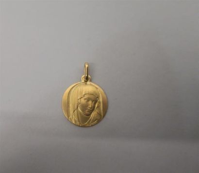 Médaille en or jaune 18K (750/oo) représentant...