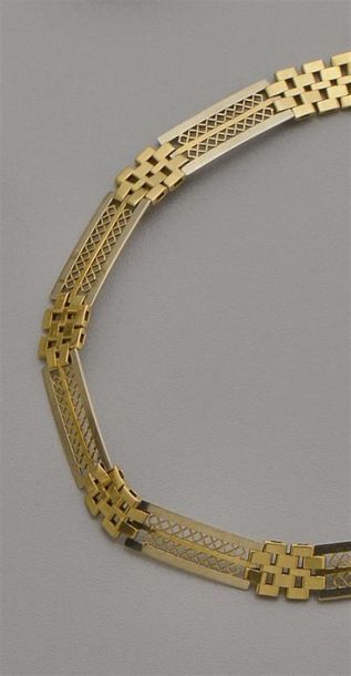 Bracelet en or de deux tons 18K (750/oo)...