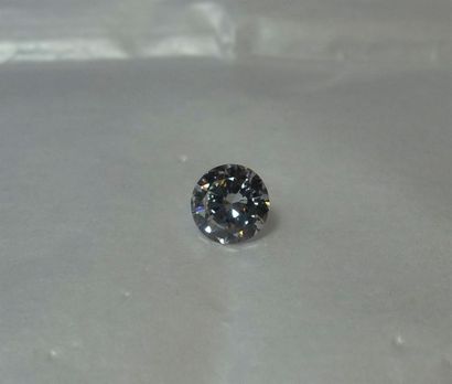 null Un diamant taille brillant non monté pesant 0,96 carat, couleur supposée G/H,...