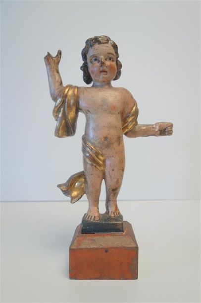 null Petit chérubin entouré d'un voilage, bois sculpté, polychromé et doré. 
XVIIIème...