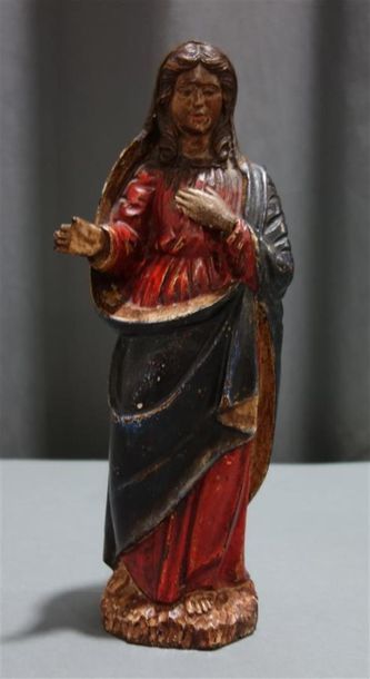 null Sainte femme, bois sculpté polychromé.
XVIIIème siècle.
H.28.5cm
Accidents,...