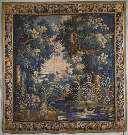 null Aubusson, Grande tapisserie, verdure à bordure en fleurs.
XVIIème siècle.
320...