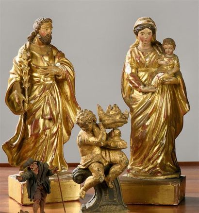 null Vierge à l'Enfant et Saint Joseph, paire de statues en bois sculpté et doré.
Fin...