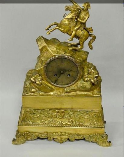 Pendule en bronze doré à décor d'un Napoleon...