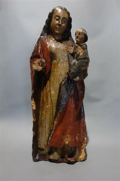 null Vierge à l'Enfant en bois sculpté repolychromé.
Fin XVIIe siècle.
H. 58 cm.
Accidents...