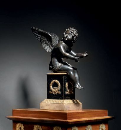 null Statuette en bronze ciselé, patiné ou doré, représentant un putto assis tendant...