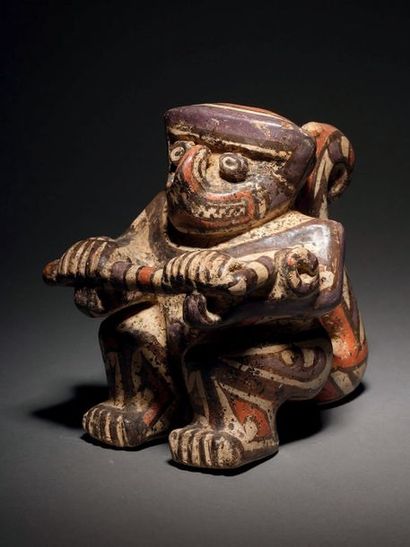 null VASE REPRESENTING A SITTED
MONKEY HOLDING A CEREMONIAL BUILDING Coclé Culture,...