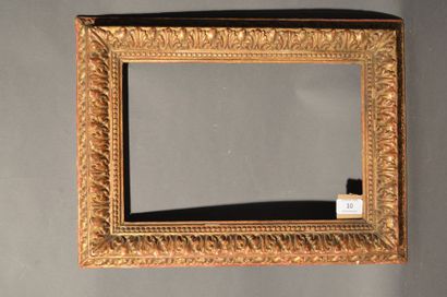 null CARVED AND GOLDED WOODEN FRAME with acanthus leaves and pearls
decoration 20th...