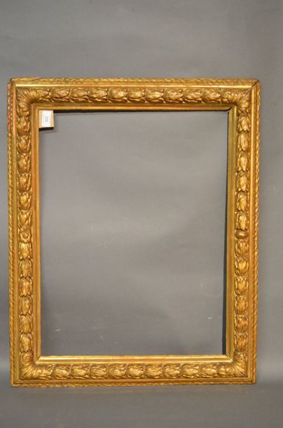 null FRAME in carved and gilded walnut with laurel
packets from Provence, 17th century
47,2...