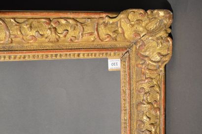 null CADRE en chêne sculpté et doré à décor Bérain
Époque Louis XIV (usures) 53,7...