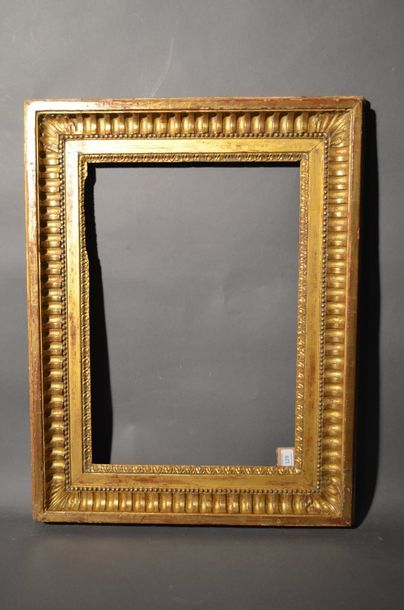 null FRAME in carved and gilded oak decorated with canals, acanthus leaves in the...