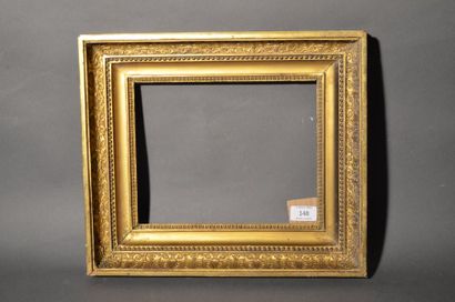null Gilded stucco and moulded walnut frame decorated with palmettes, pearls and...