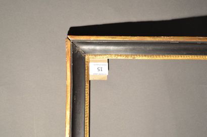 null PAIR OF WOODEN GORGES in moulded wood and black and gold stucco with raise-of-heart...