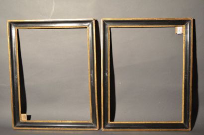 null PAIR OF WOODEN GORGES in moulded wood and black and gold stucco with raise-of-heart...