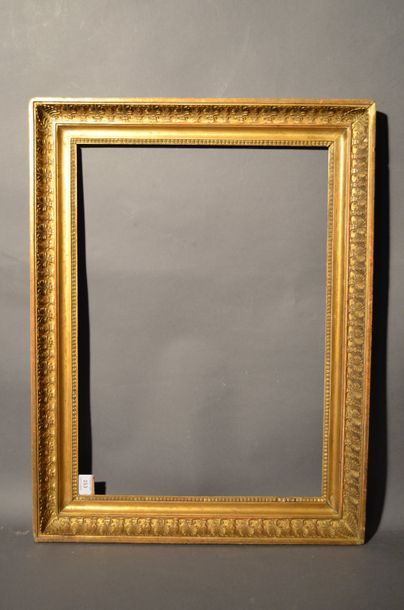 null FRAME In moulded wood and gilded stucco with palmette and raise-of-heart decoration...
