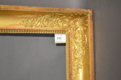 null Gilded stucco and moulded wood frame with palmette and foliage decoration in...