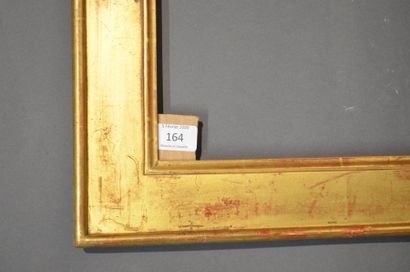null FLAT FRAME in moulded wood and gilded stucco, rush on the outside and soft to...