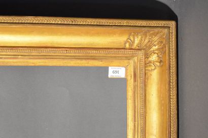 null Moulded wood frame with gilded stucco and gilded stucco with piastres on the...